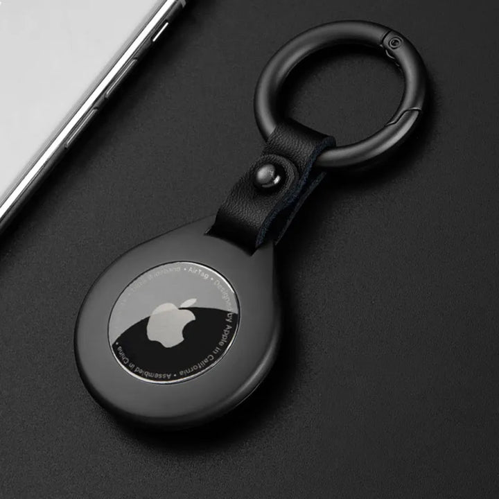 Black leather metal pendant case for item trackers, offering luxury protection.