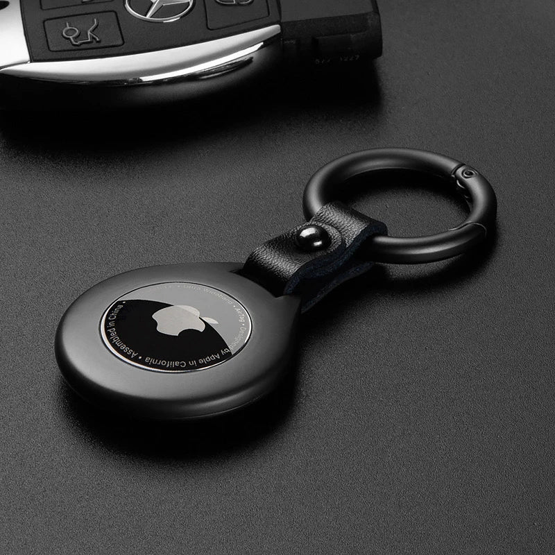 Luxury black leather tracker case with metal accent, elegant key finder protection.