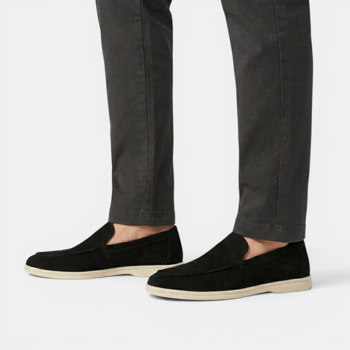 Light gray men's slip-on loafers for a modern casual style.