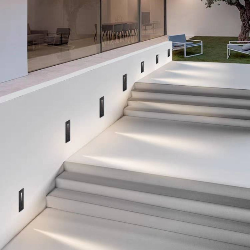 Hardwired LED deck light, ideal for modern exterior design.