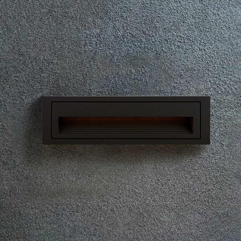 White LED step light providing ambient light for garden steps.