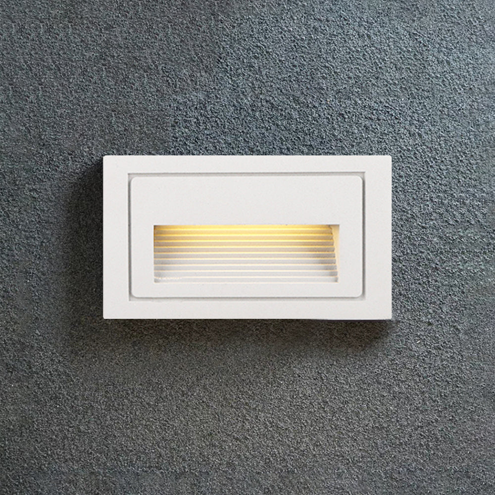 Energy-efficient black LED step light for exterior use.