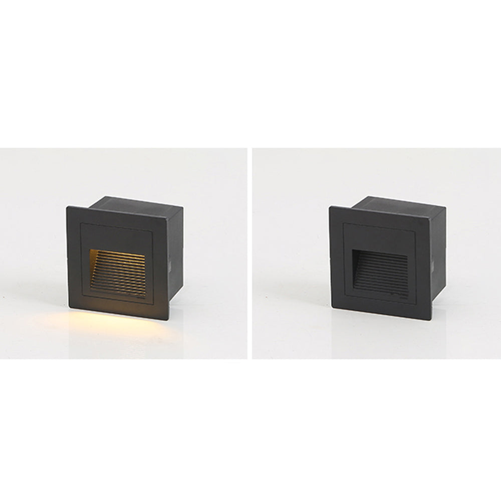 Square LED step light, ideal for contemporary outdoor lighting.