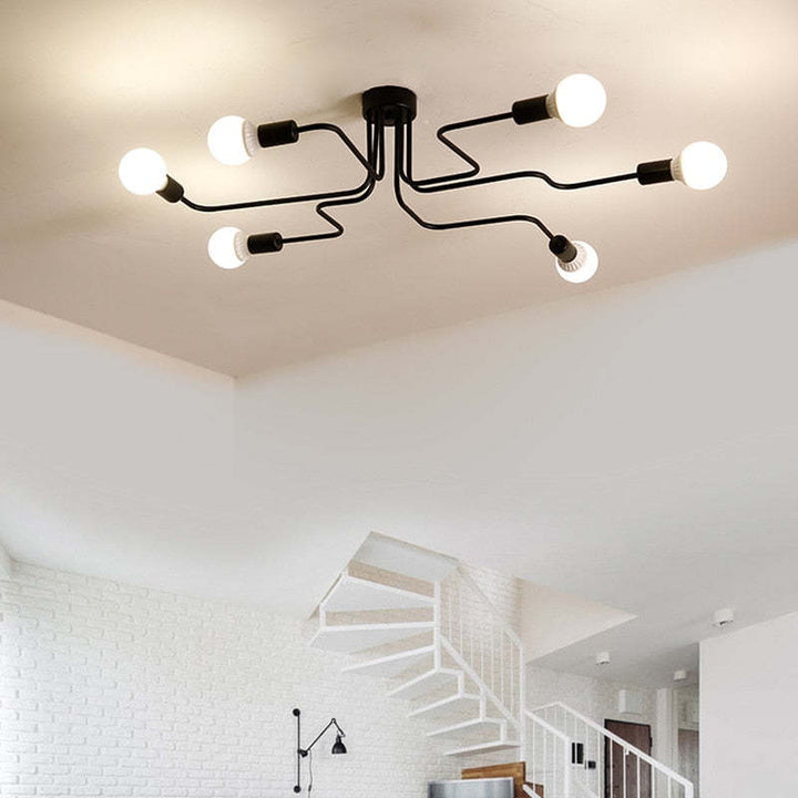 Stylish black modern vintage flush mount ceiling light for indoor home lighting.