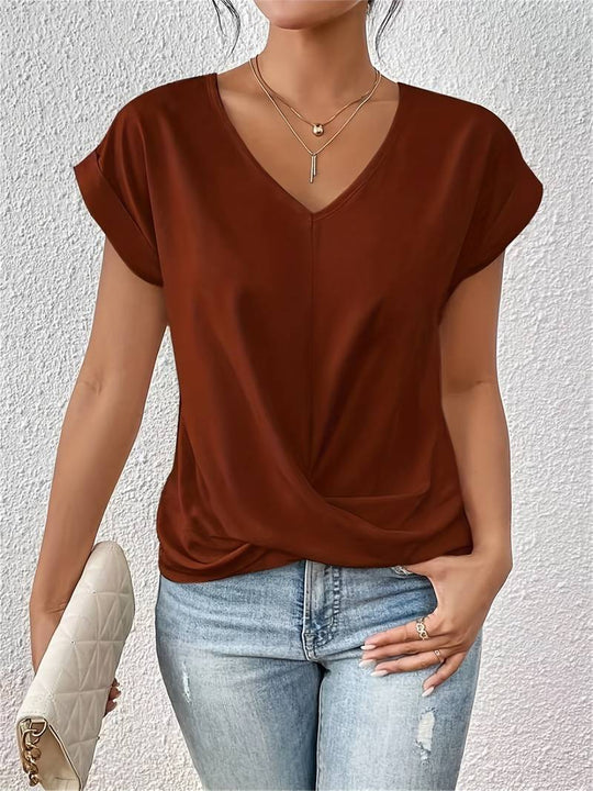 White women's basic short sleeve tee, comfortable & versatile for everyday wear. Relaxed fit casual top.