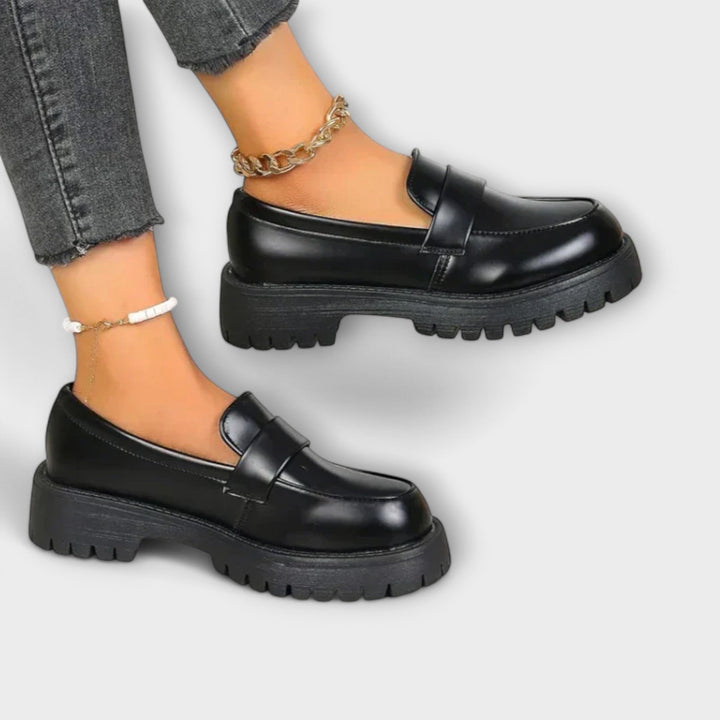 Stylish women's orthopaedic loafers, providing comfortable arch support and durable design for all-day wear.