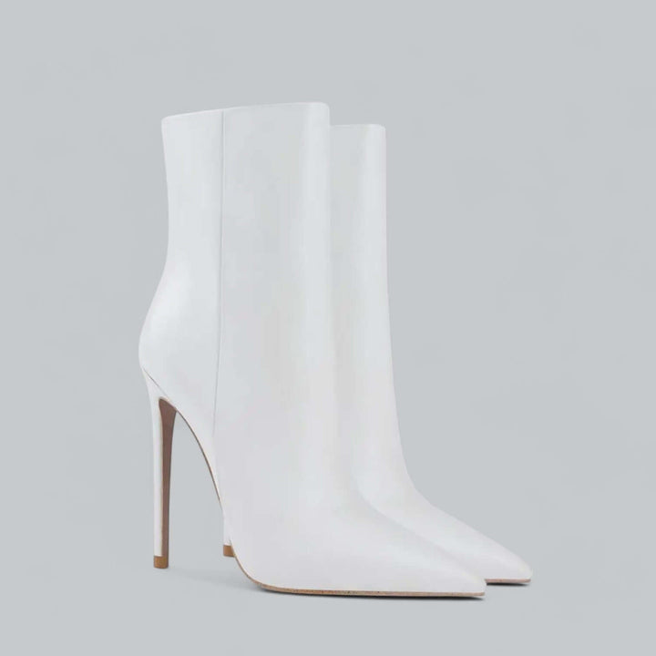 Luxurious women's pointed toe stiletto ankle boots, ideal high heel fashion footwear.