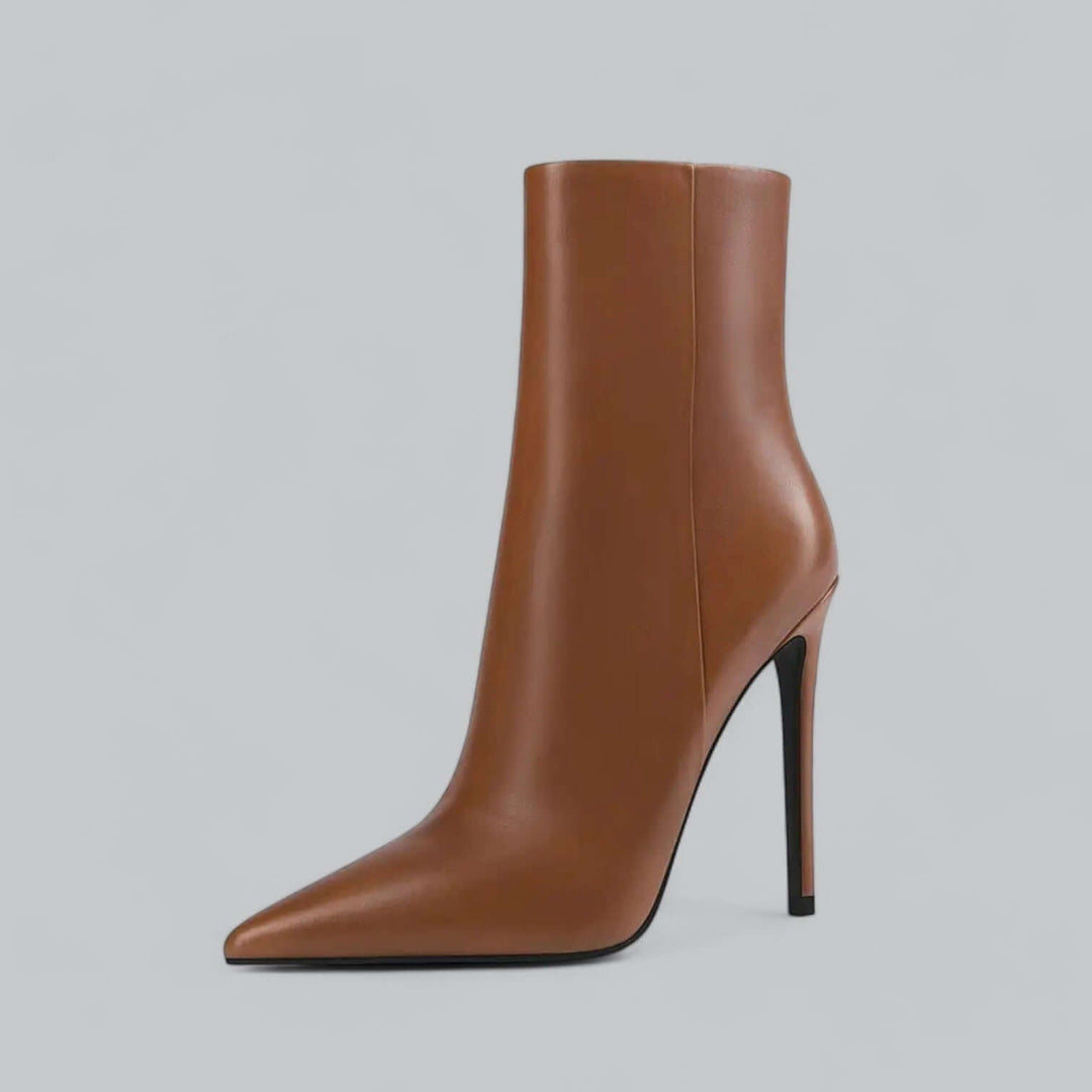 Chic women's pointed toe stiletto ankle boots, stylish high heel fashion footwear.