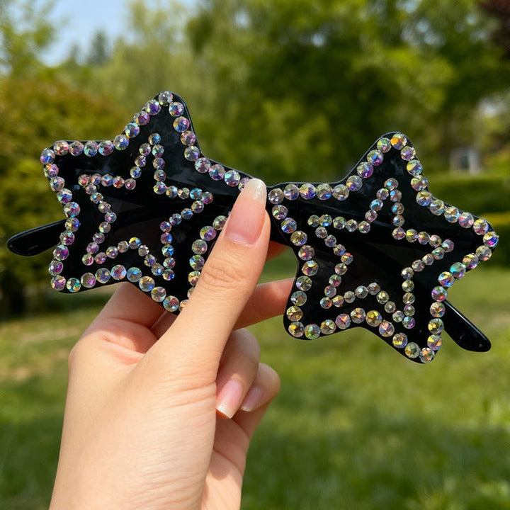 Black women's star-shaped rhinestone sunglasses, dazzling fashion eyewear for parties.