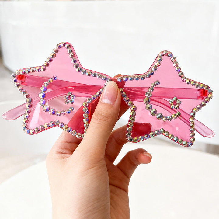 Elegant star-shaped rhinestone sunglasses for women, a dazzling fashion statement eyewear.