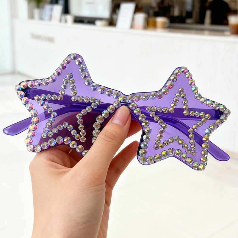 Unique star-shaped sunglasses for women, featuring brilliant rhinestone embellishments.