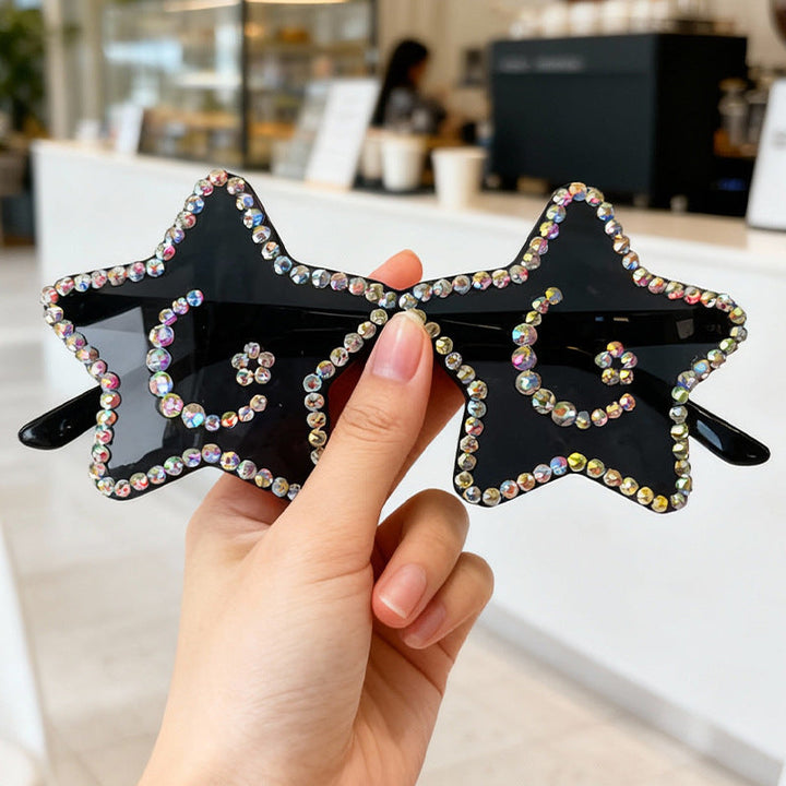 Chic black rhinestone star sunglasses, women's stylish eyewear, great for any party.