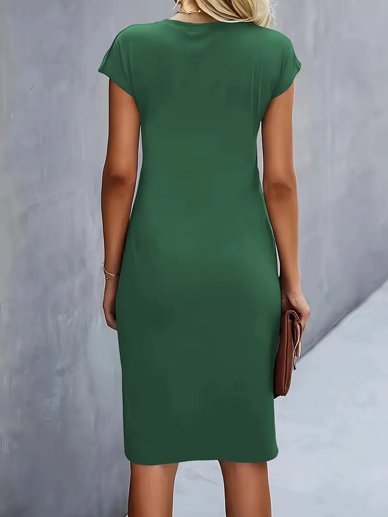Smart casual black work dress, cap sleeve, ruched waist, designed to be figure-flattering.