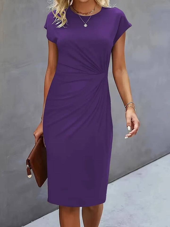 Red professional bodycon dress, cap sleeve, ruched waist, suitable for smart casual occasions.