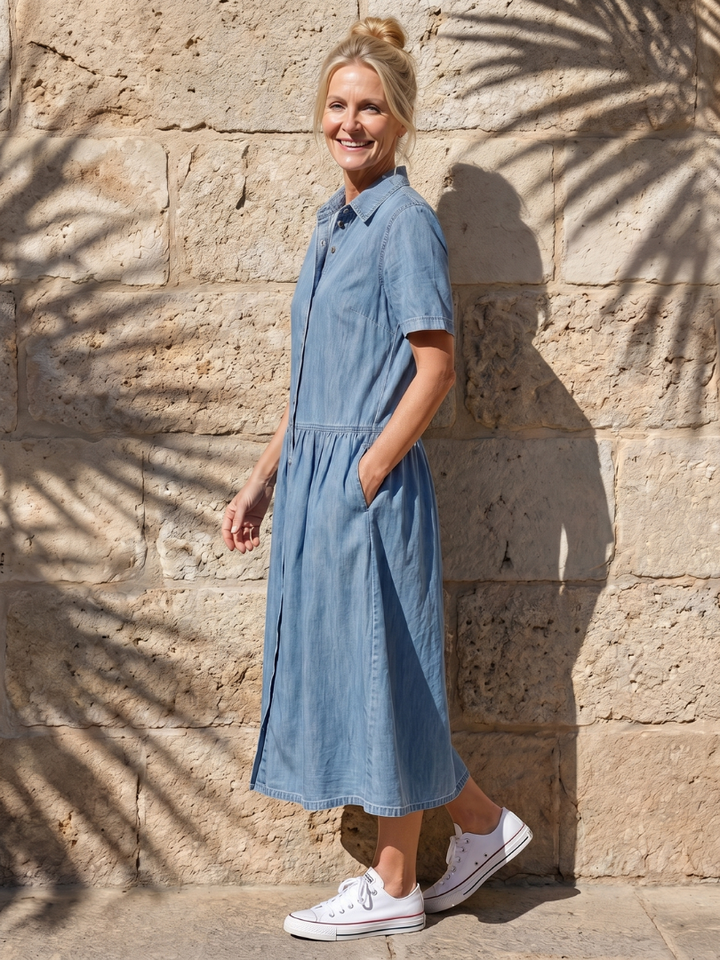 Comfortable women's blue midi dress with a collared neckline, gathered waist, & short sleeves, ideal for everyday summer.