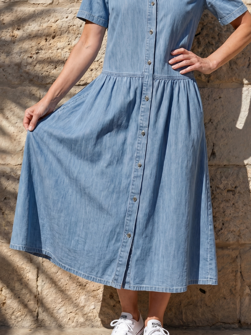 Effortless women's collared midi dress in blue, featuring a gathered waist, short sleeves, and a practical button front.
