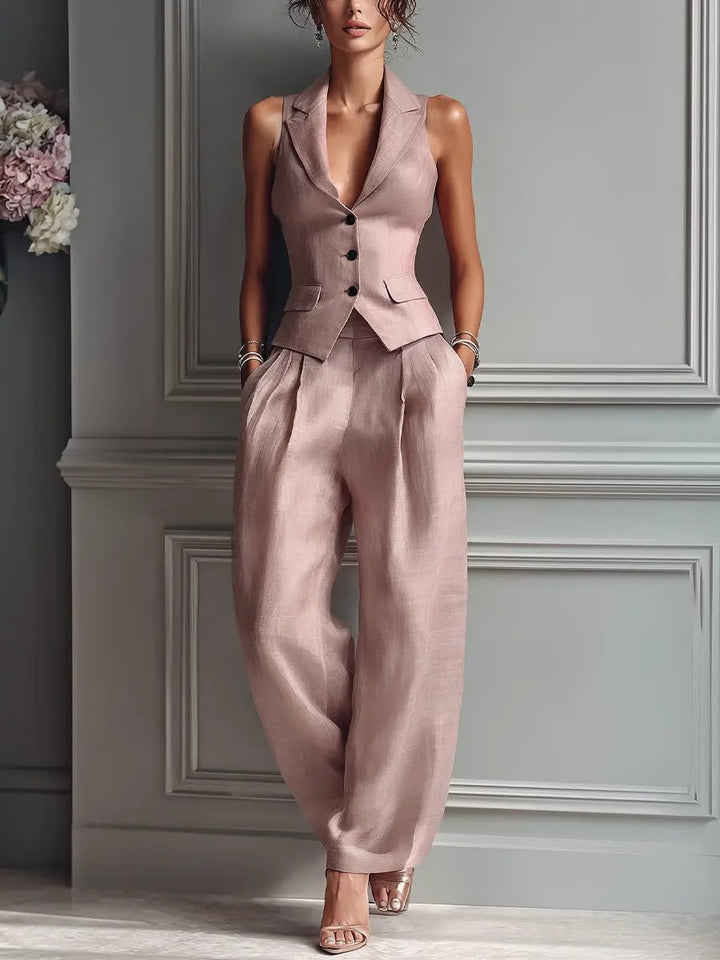 Elegant women's linen vest and wide-leg trousers set in blush pink, a stylish two-piece summer outfit.