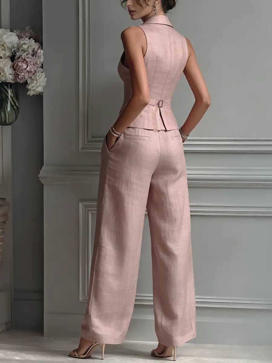 Women's elegant blush pink linen set: sleeveless lapel vest and fashionable wide-leg trousers for a refined look.