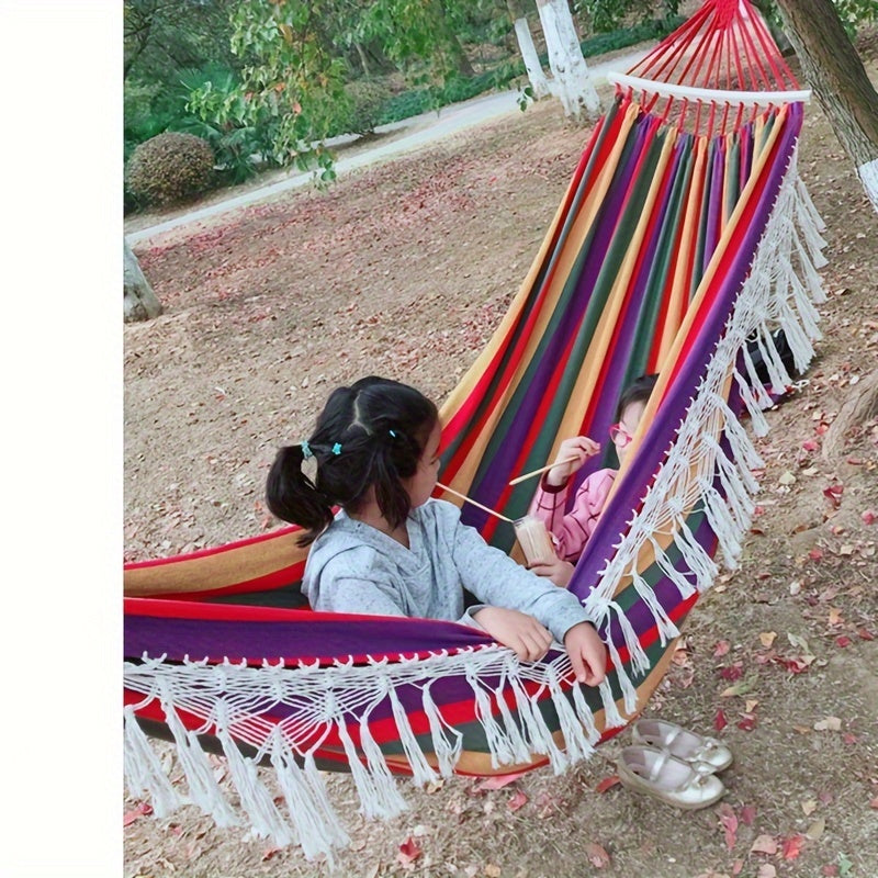 Outdoor bohemian double hammock, soft cotton for garden & patio relaxation.