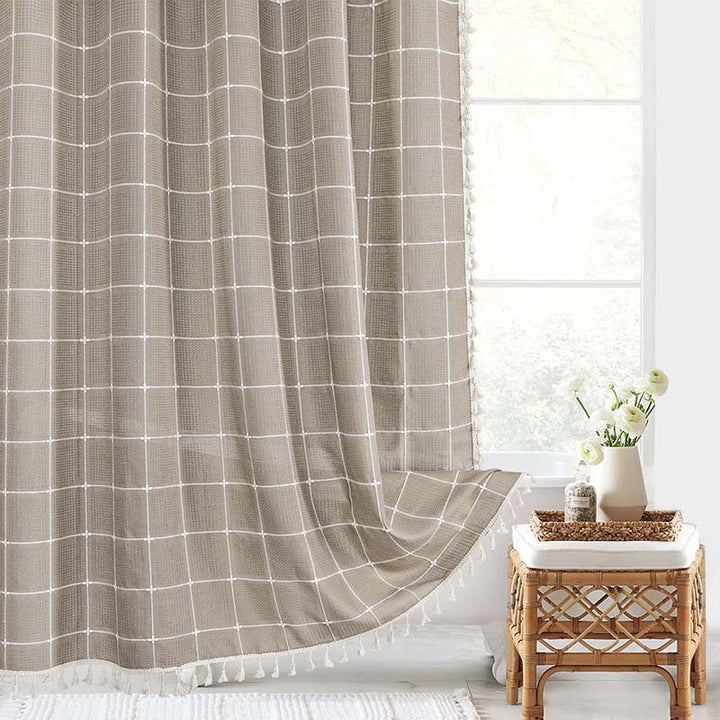 Chic bohemian farmhouse style waterproof linen shower curtain, ideal for modern rustic bathrooms.