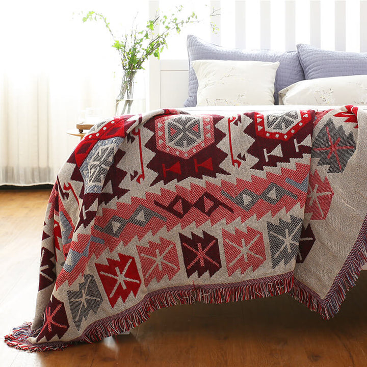 Tassel knitted bohemian sofa throw blanket. Adds a cozy, ethnic touch to home decor.