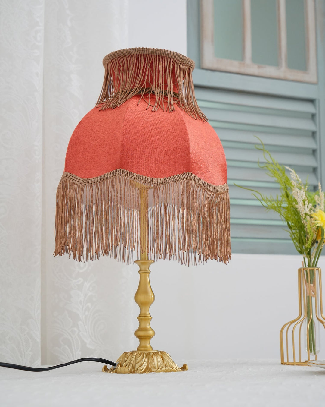 Red tassel table lamp, bohemian design brings a cozy, modern eclectic feel to any room.