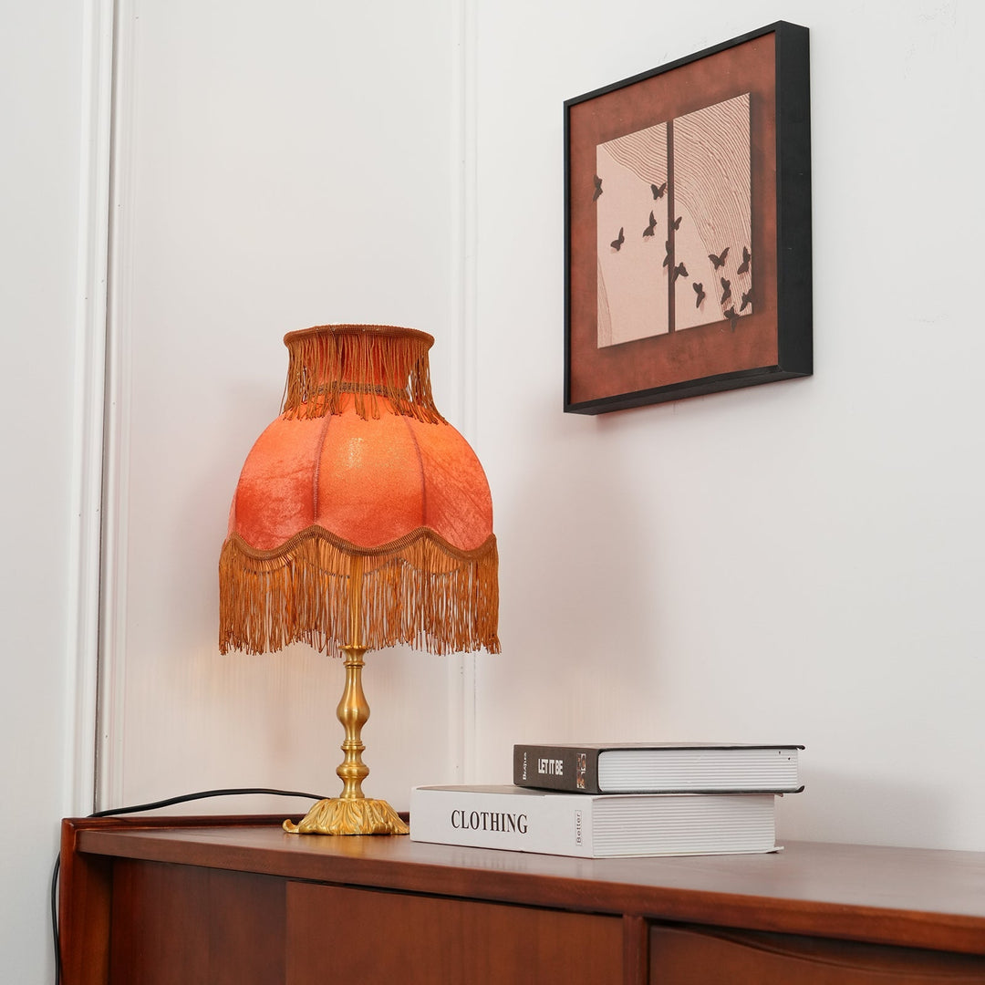 Classic home red table lamp, modern eclectic style with unique tassel decor & warm light.