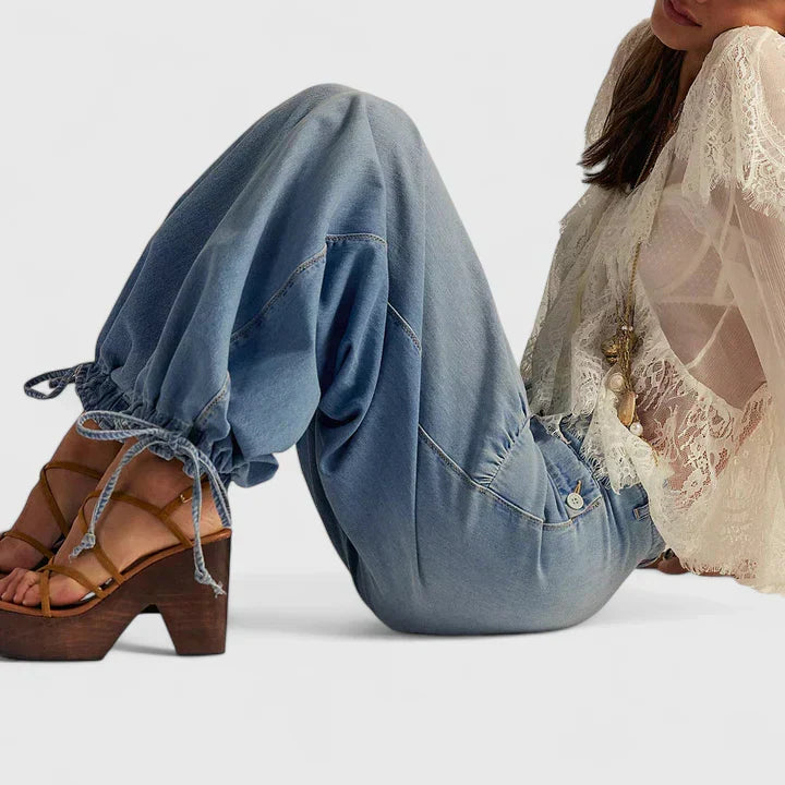 Flowy bohemian wide leg pleated trousers for women, offering effortless style and comfort.