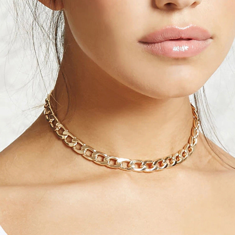 Bold gold link chain statement necklace for women, elegant fashion accessory. Adjustable & stylish.