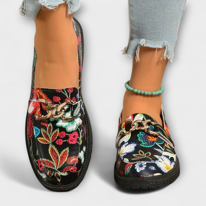 Vibrant women's fashion loafers, featuring a striking multicolor design and comfortable fit for versatile style.