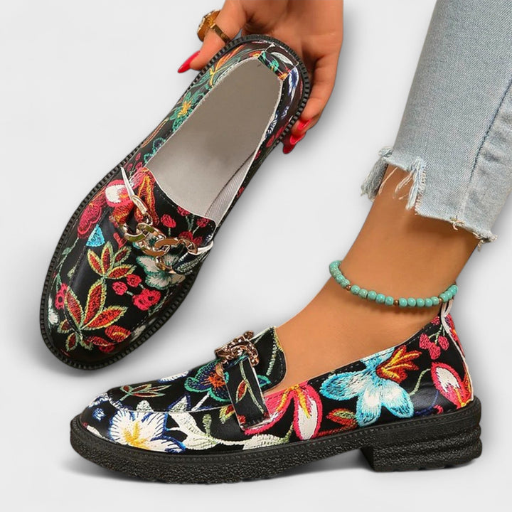 Eye-catching women's loafers in a vibrant multicolor design, ideal for a bold fashion statement and versatile wear.