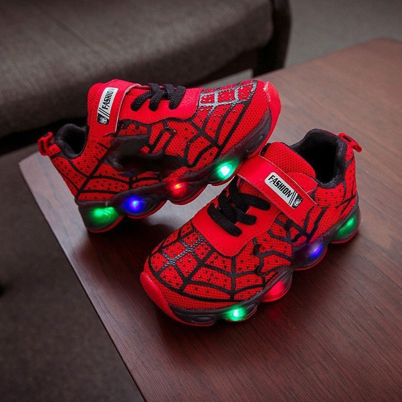 Bright blue kids' light-up superhero sneakers with durable soles & easy velcro straps, perfect for active boys & girls.