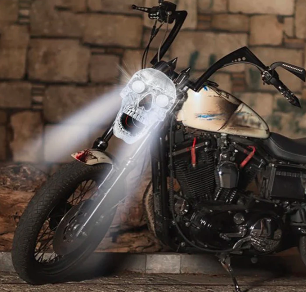 Custom motorcycle LED skull headlight, a unique retro biker accessory enhancing safety & bike style.