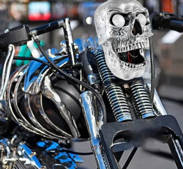 Powerful LED skull bike headlight, essential motorcycle accessory for custom builds & improved night visibility.