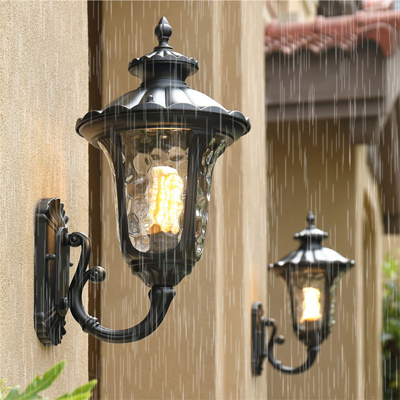 Decorative outdoor waterproof lighting, bronze & black, with an attractive glass shade.