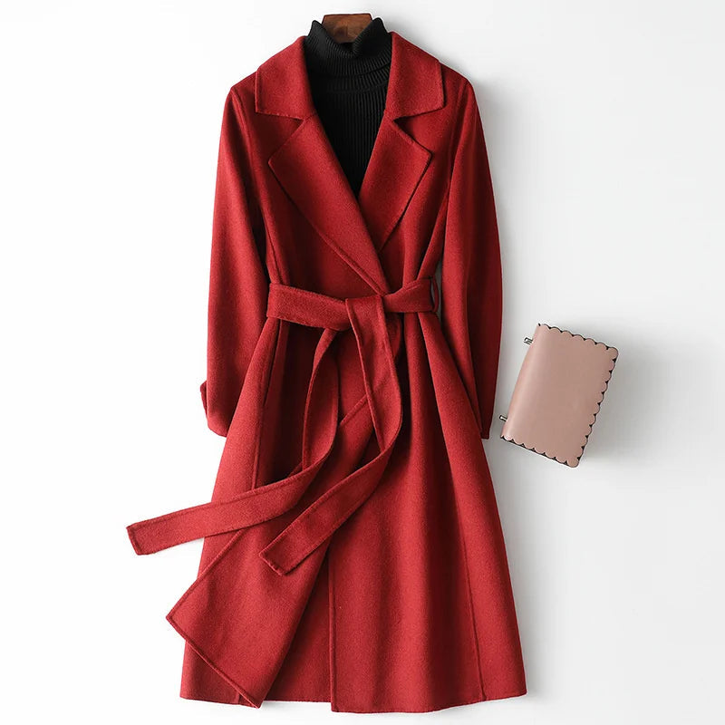 Burgundy elegant women's belted wrap coat with a stylish notch lapel, perfect for winter fashion.