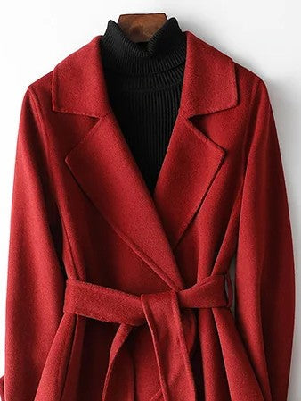 Stylish women's long A-line wrap coat in burgundy, featuring a sophisticated notch lapel and belt for elegant outerwear.