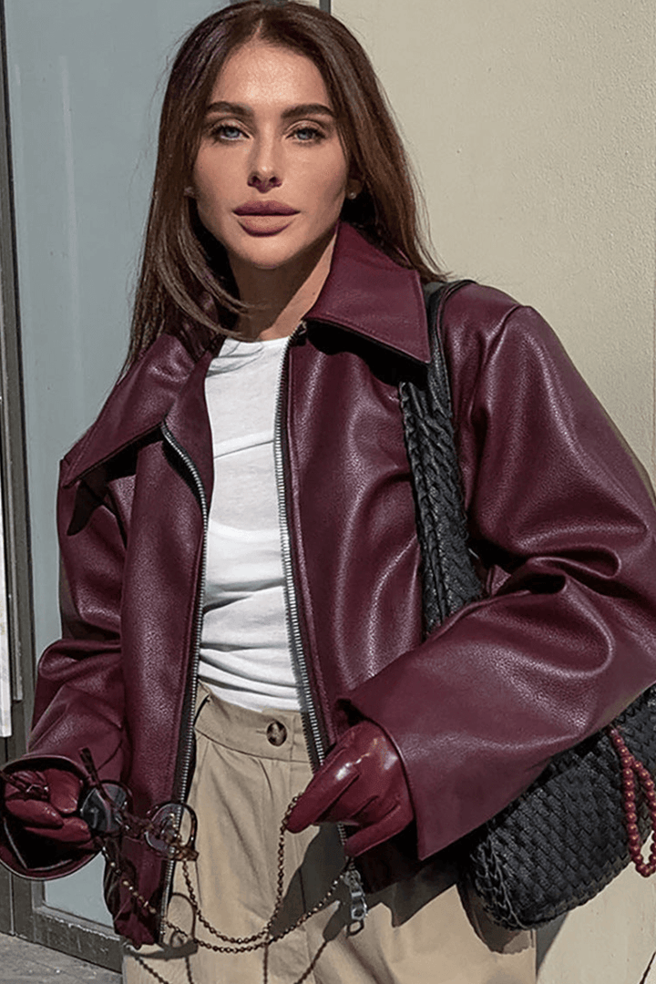 Burgundy women's chic cropped jacket with zipper, perfect for modern layering and stylish everyday comfort.