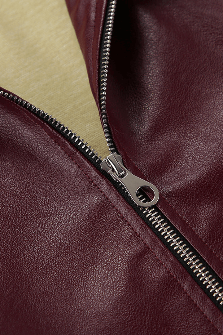 Women's fashionable cropped burgundy jacket, offering a modern silhouette and comfortable design.