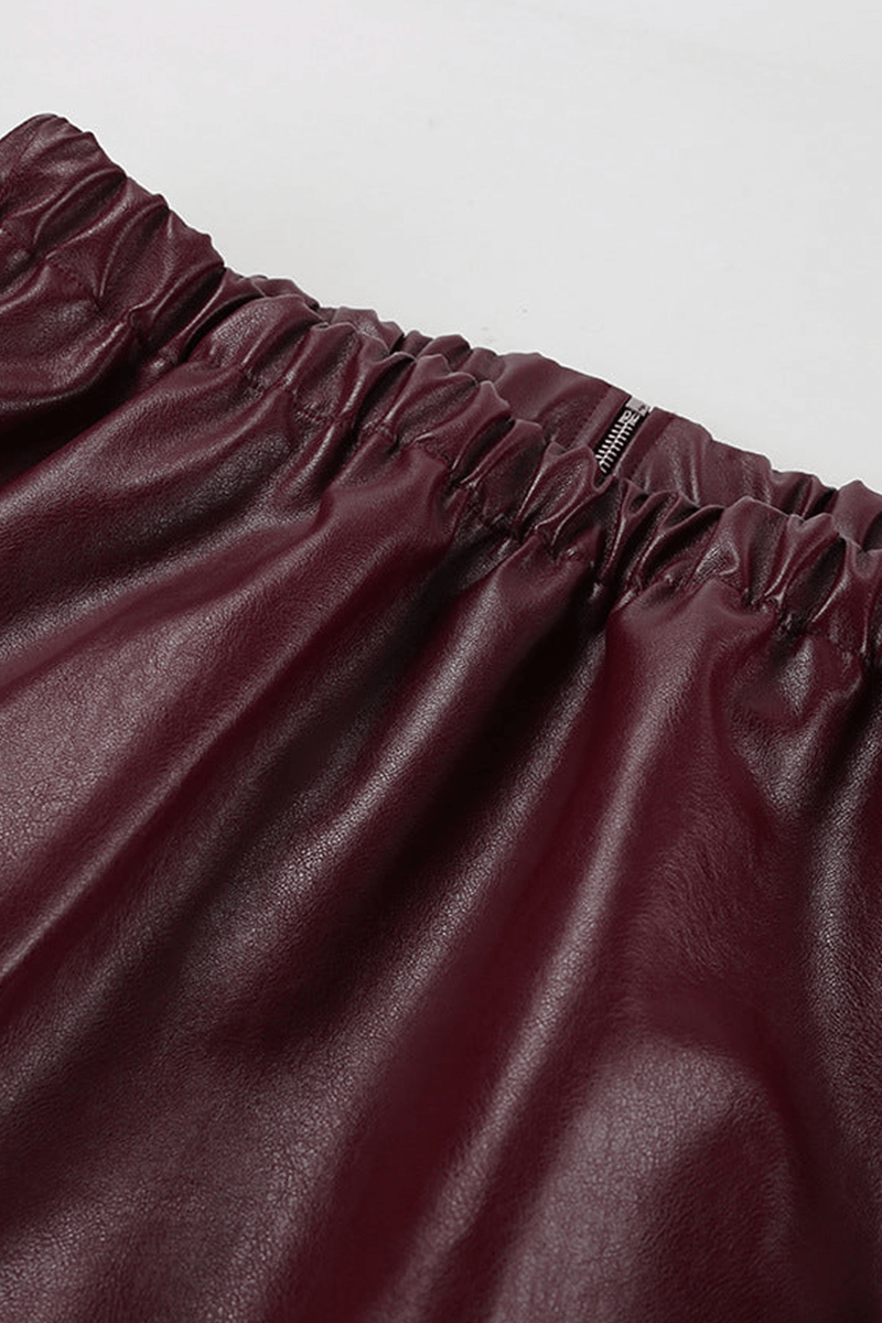 Comfortable and chic women's burgundy cropped jacket, featuring a modern zipper for versatile styling.