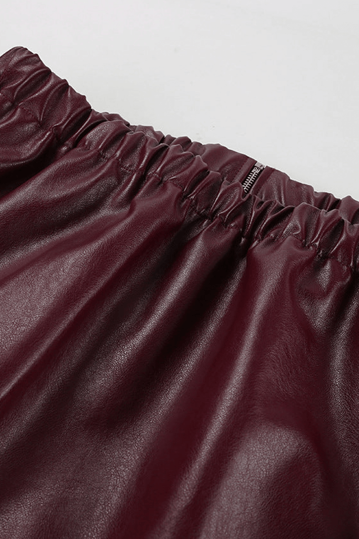 Comfortable and chic women's burgundy cropped jacket, featuring a modern zipper for versatile styling.