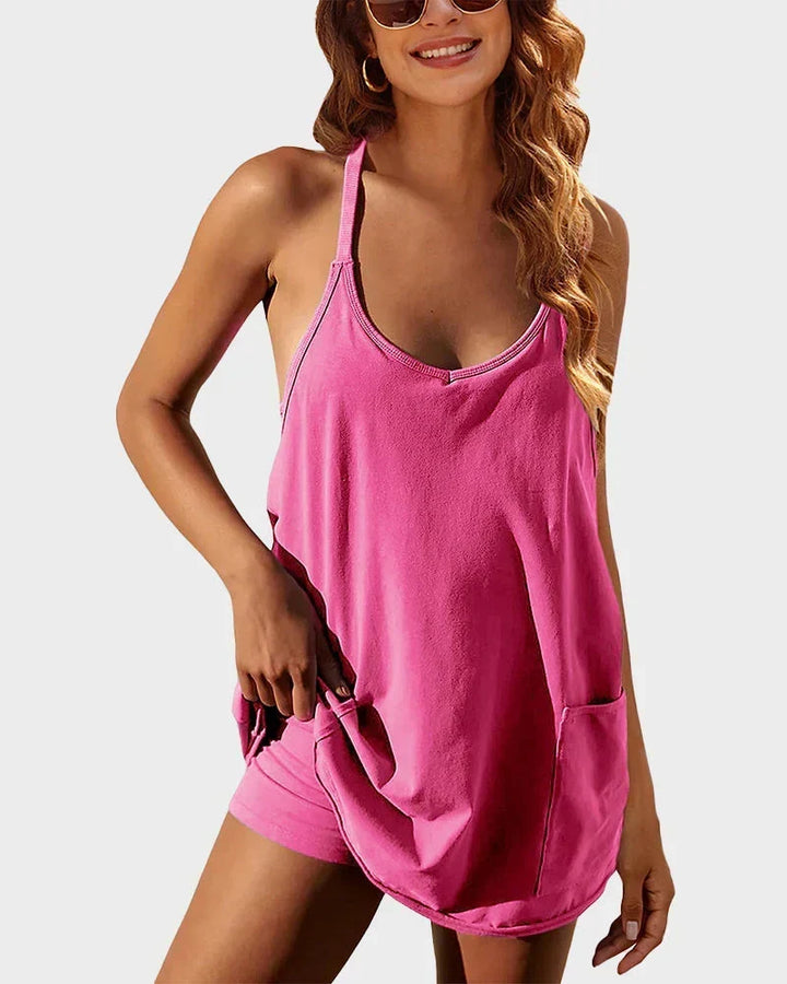 Women's scoop neck mini dress with built-in shorts, a comfortable choice for warm weather.