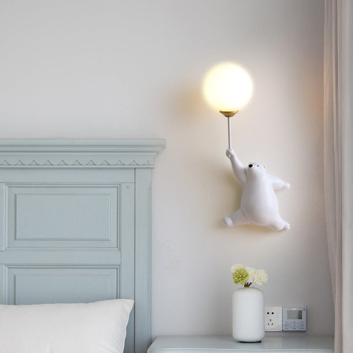 Playful bear wall lamp, an adorable LED light, ideal for cozy children's bedrooms.