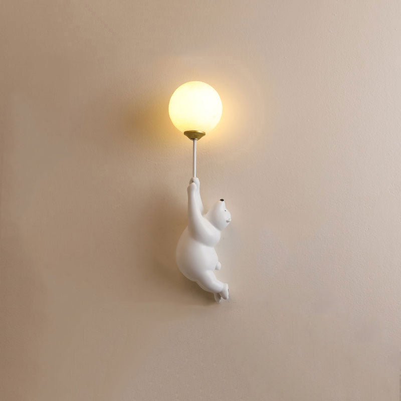 Decorative bear wall sconce, modern LED light with an animal theme for kids' rooms.