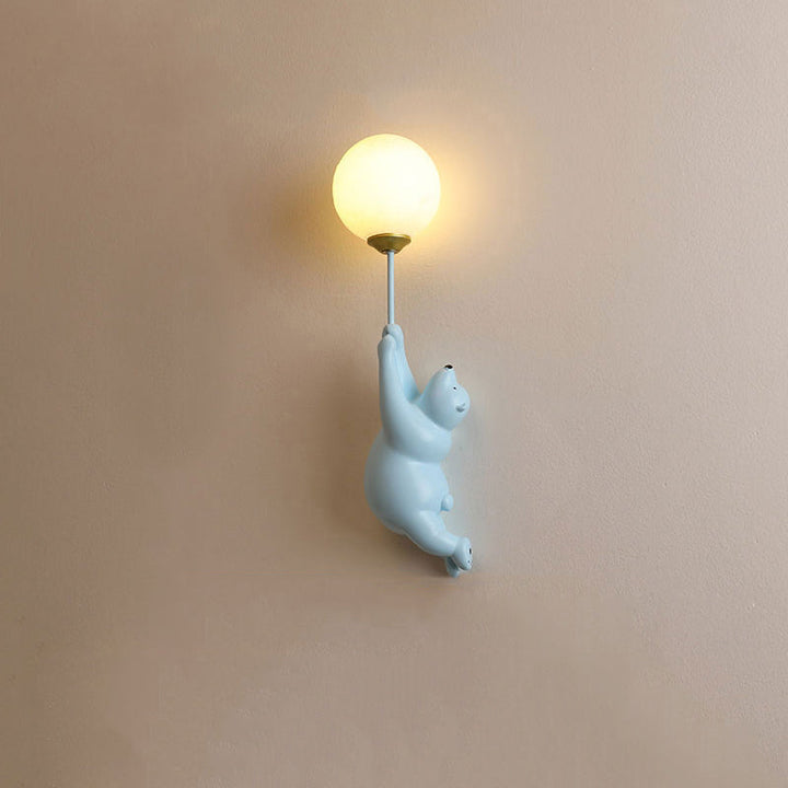 Nursery bear wall sconce, a charming LED lamp with an animal theme for cozy lighting.