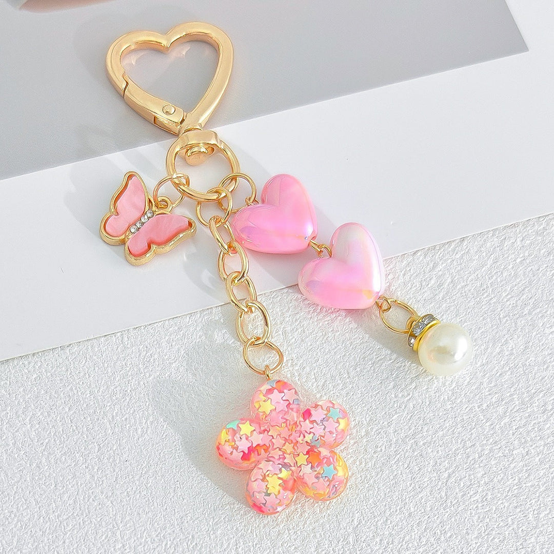 Cute heart & flower keychain. A delightful bag charm and durable key accessory for any fashionista.