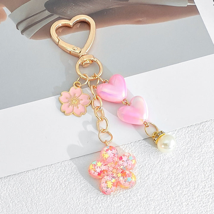 Versatile heart & flower keychain. Doubles as a cute bag charm and stylish key accessory, durable.