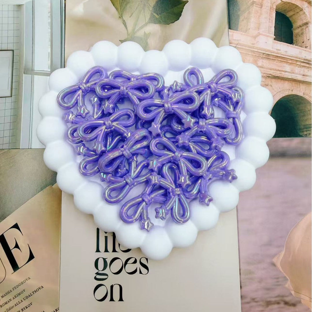 Cute heart bow holder for girls, keeps hair clips tidy & displayed. Lovely girls room decor.