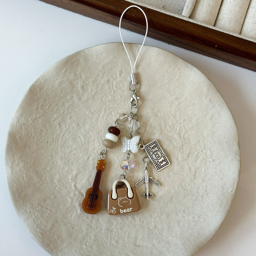 Fashionable keychain charm to accessorize bags & keys. Express personality with this playful gift.
