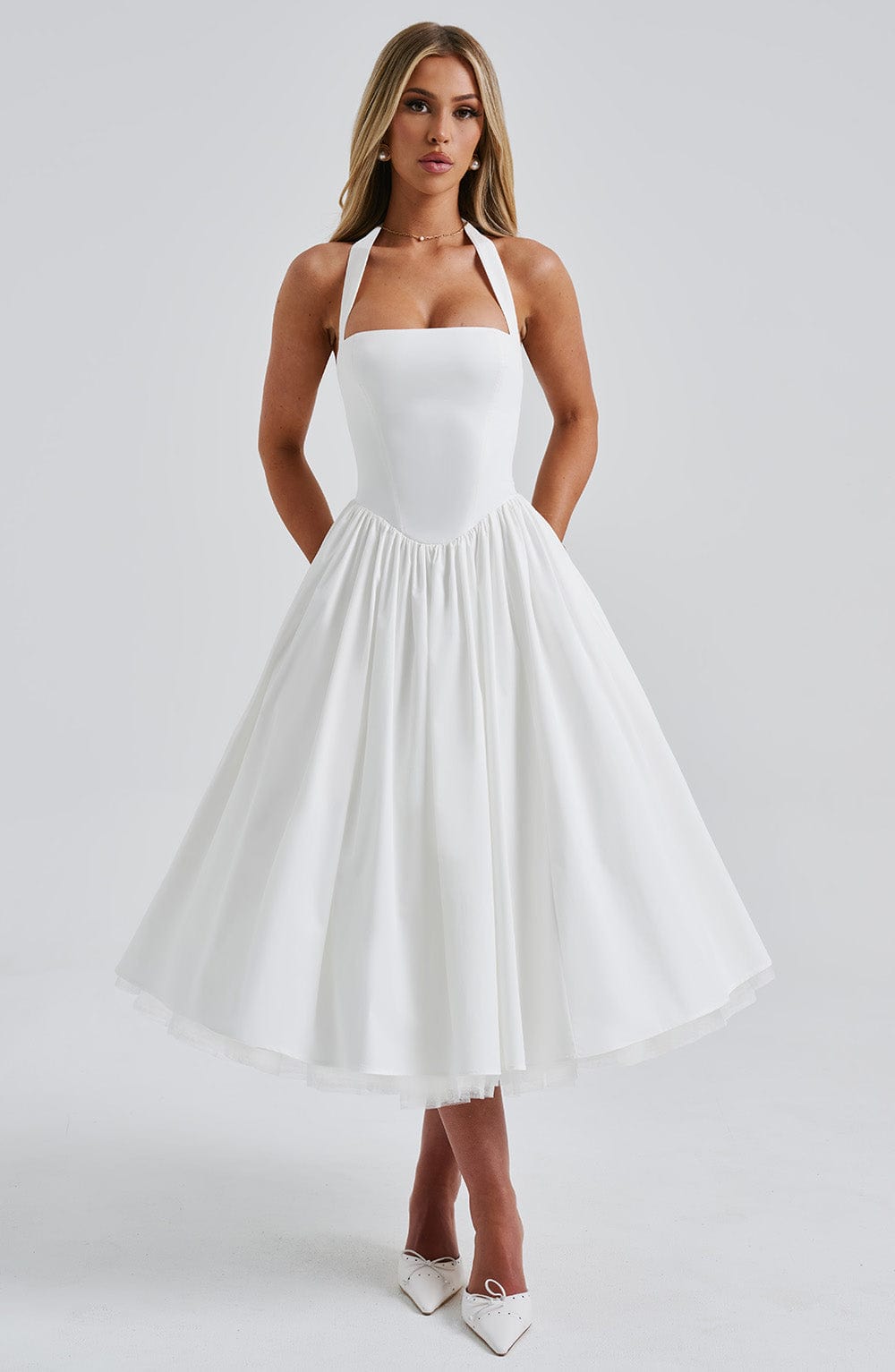 Black elegant women's midi dress. Halter neck design for formal events & special occasions.